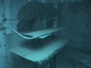 Inside the laundry is an ironing press